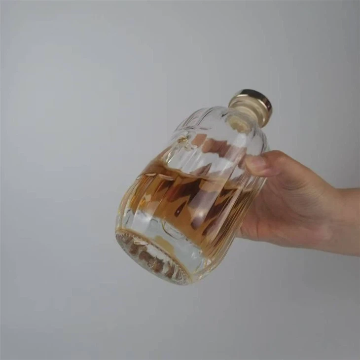 Thick Bottom Oval Glass Liquor Bottle With T Cap